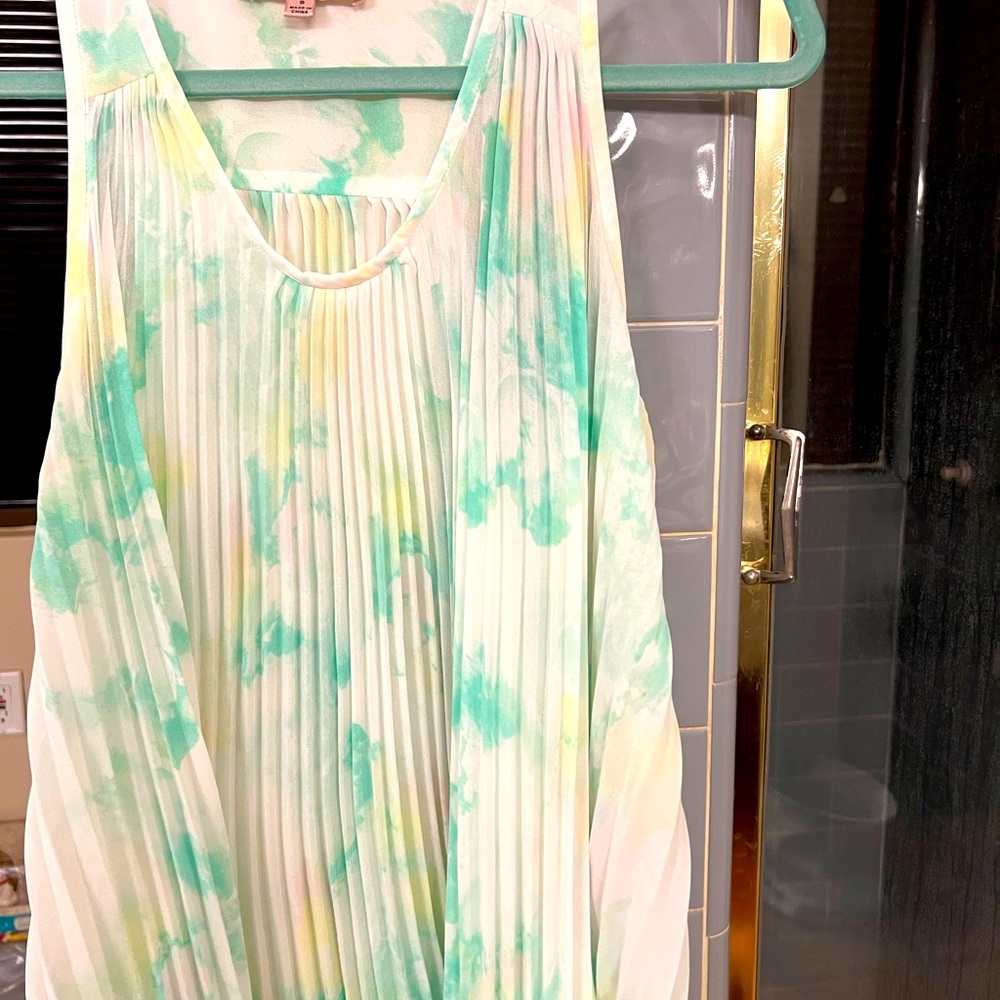 Light green and white pleated loose top